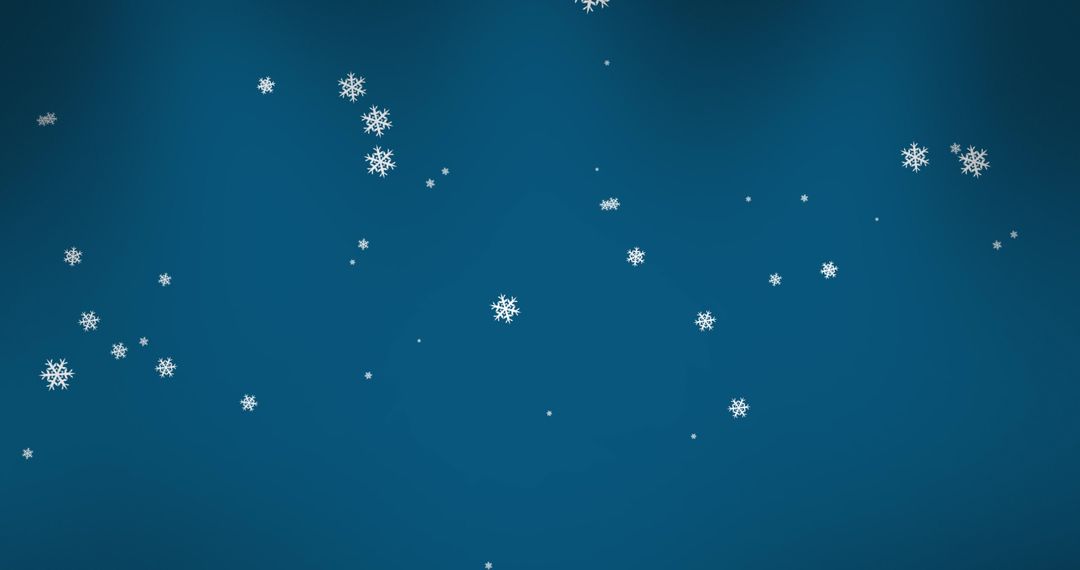 Delicate Snowflakes Falling Against Tranquil Blue