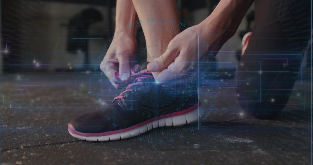 Kneeling woman tying running shoe with pink laces and futuristic digital HUD overlay