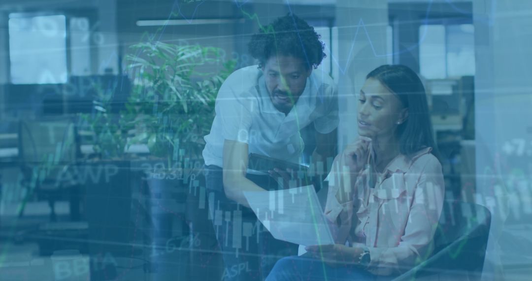 Collaborative Team Analyzing Stock Market Data in Modern Office