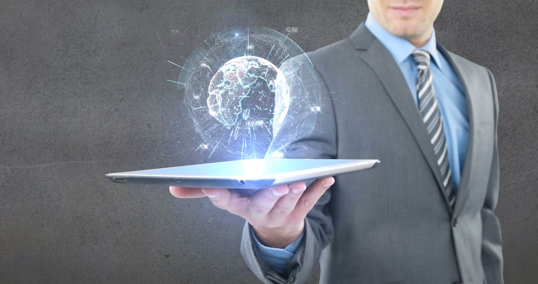 Businessman Holding Tablet with Holographic Globe Artificial Intelligence Concept - Free Images, Stock Photos and Pictures on Pikwizard.com