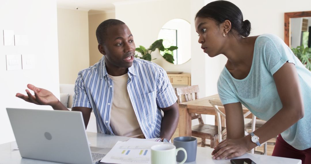 Couple Discussing Finances at Home
