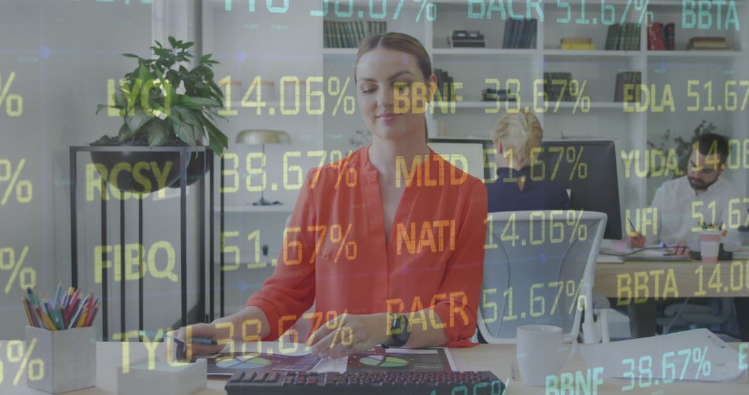 Confident Businesswoman Analyzing Financial Data on Computer