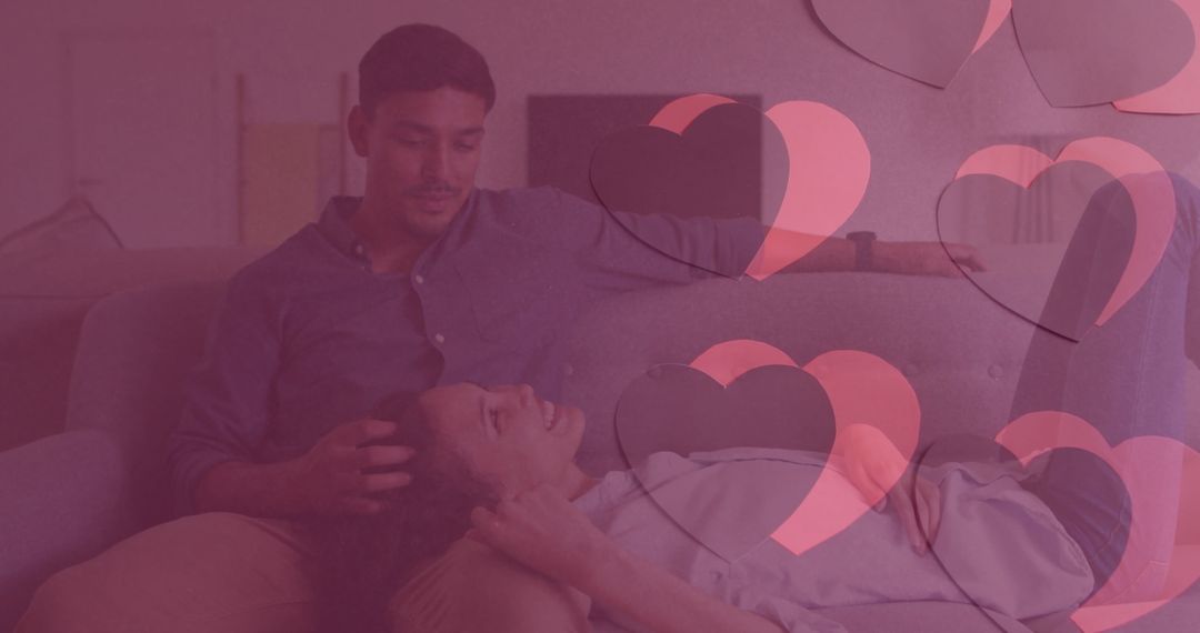 Hearts Overlay on Couple Conversing at Home