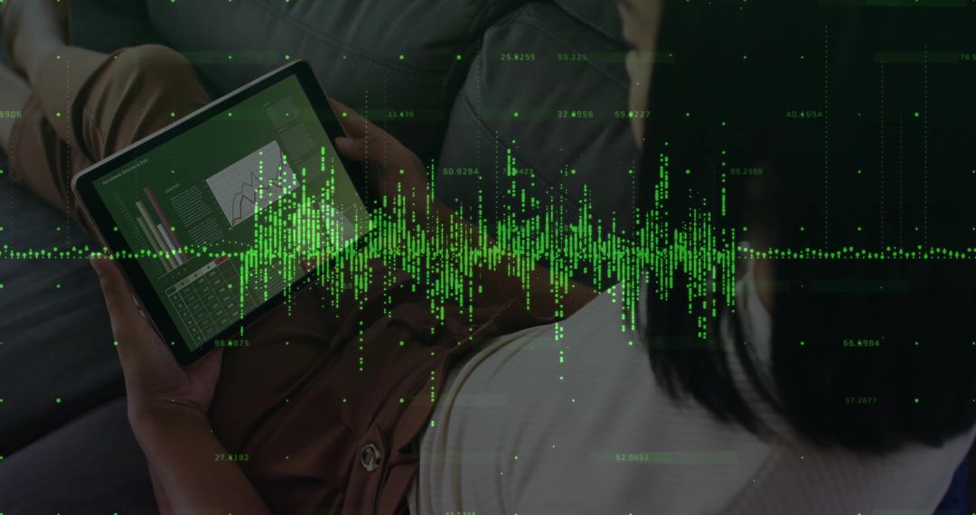 Woman Analyzing Data on Tablet with Futuristic Green Graphics