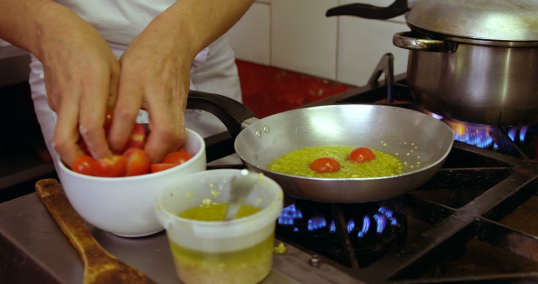 Chef Preparing Meal in Professional Kitchen with Fresh Ingredients - Free Images, Stock Photos and Pictures on Pikwizard.com