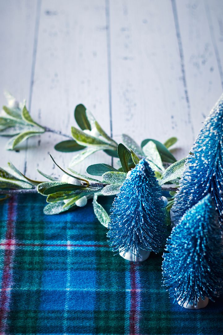Frosted Blue Christmas Trees with Festive Background Decor