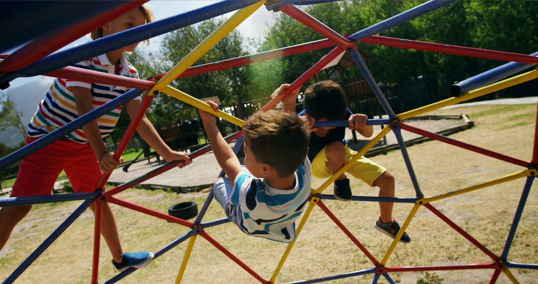 Children Climbing Colorful Playground Structure on Sunny Day - Free Images, Stock Photos and Pictures on Pikwizard.com