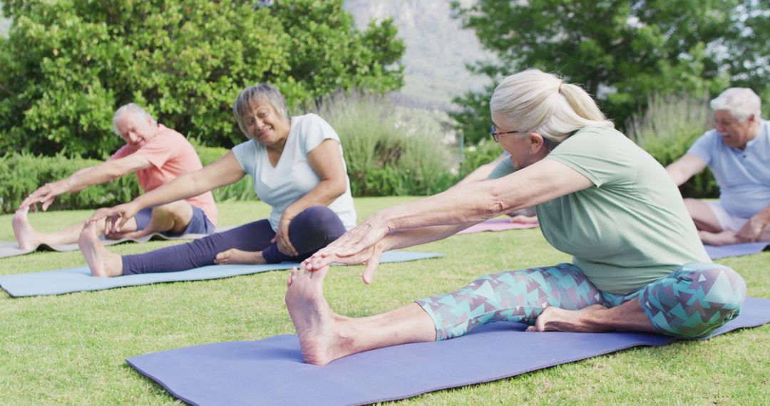 Senior Group Practicing Yoga Stretches in Park - Free Images, Stock Photos and Pictures on Pikwizard.com