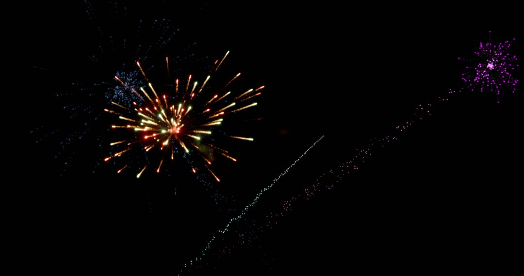Bright Fireworks Exploding Against a Night Sky Celebrating Festivity