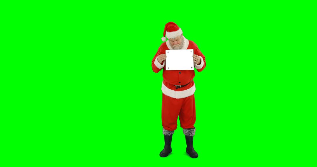 Santa Claus Holding Blank Sign on Green Screen - Free Images, Stock Photos and Pictures on Pikwizard.com