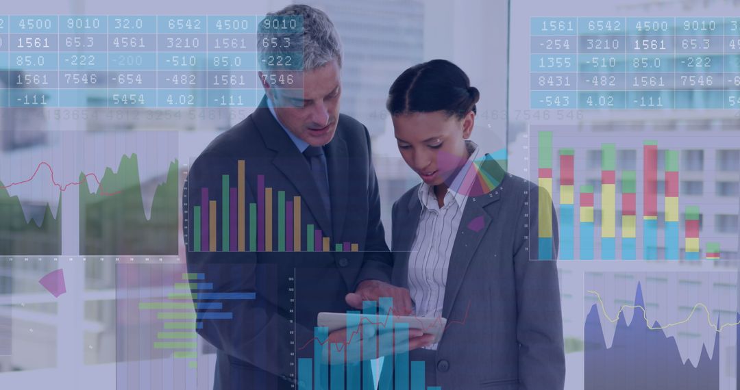 Business Professionals Analyzing Financial Data on Digital Tablet