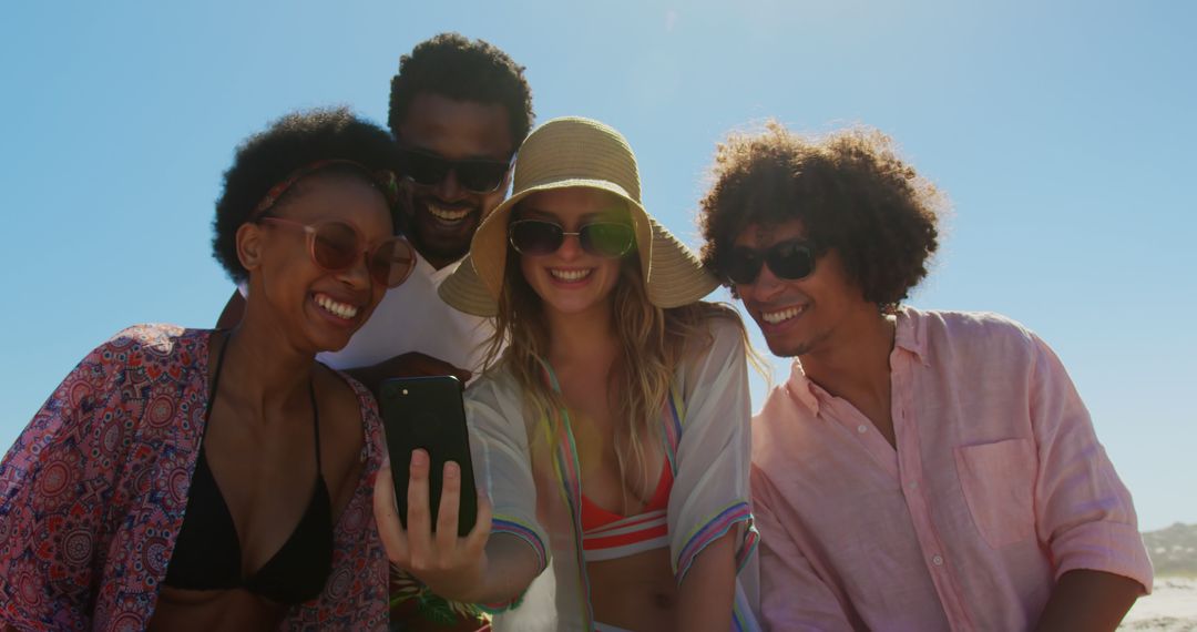 Diverse Friends Taking Selfie on Sunny Beach - Free Images, Stock Photos and Pictures on Pikwizard.com