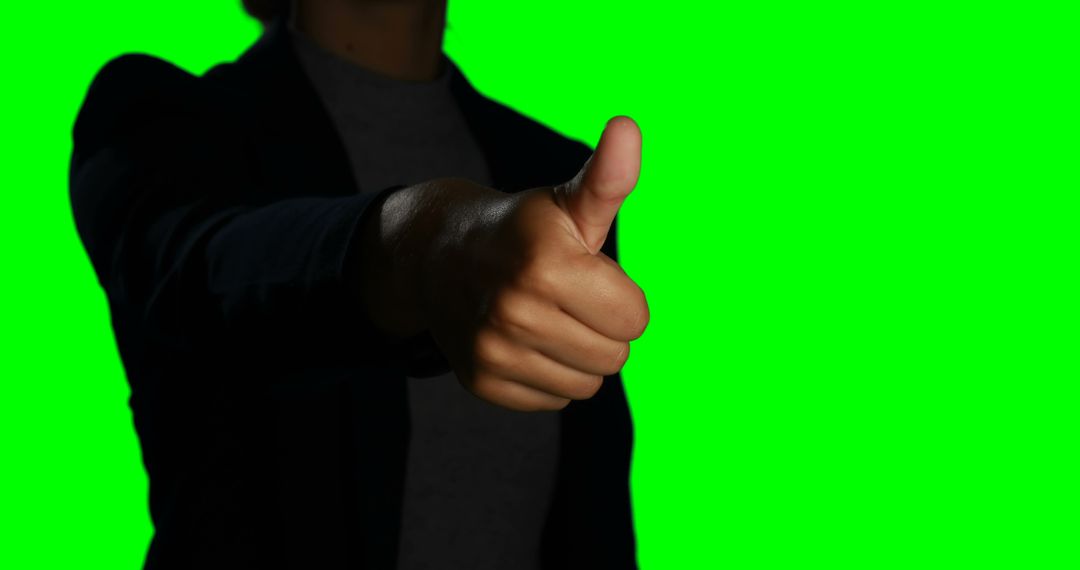 Person Giving Thumbs Up on Green Background - Free Images, Stock Photos and Pictures on Pikwizard.com