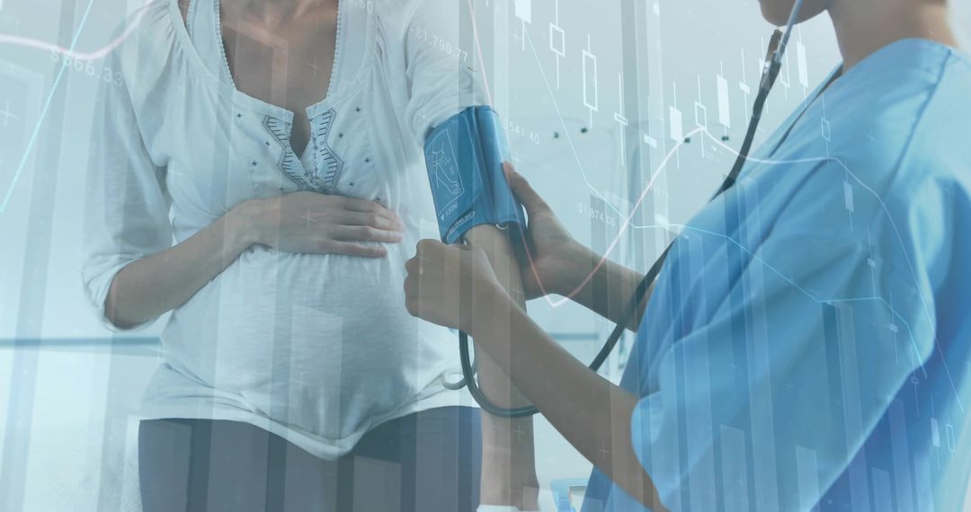 Pregnant patient receiving blood pressure monitoring from nurse with data overlay