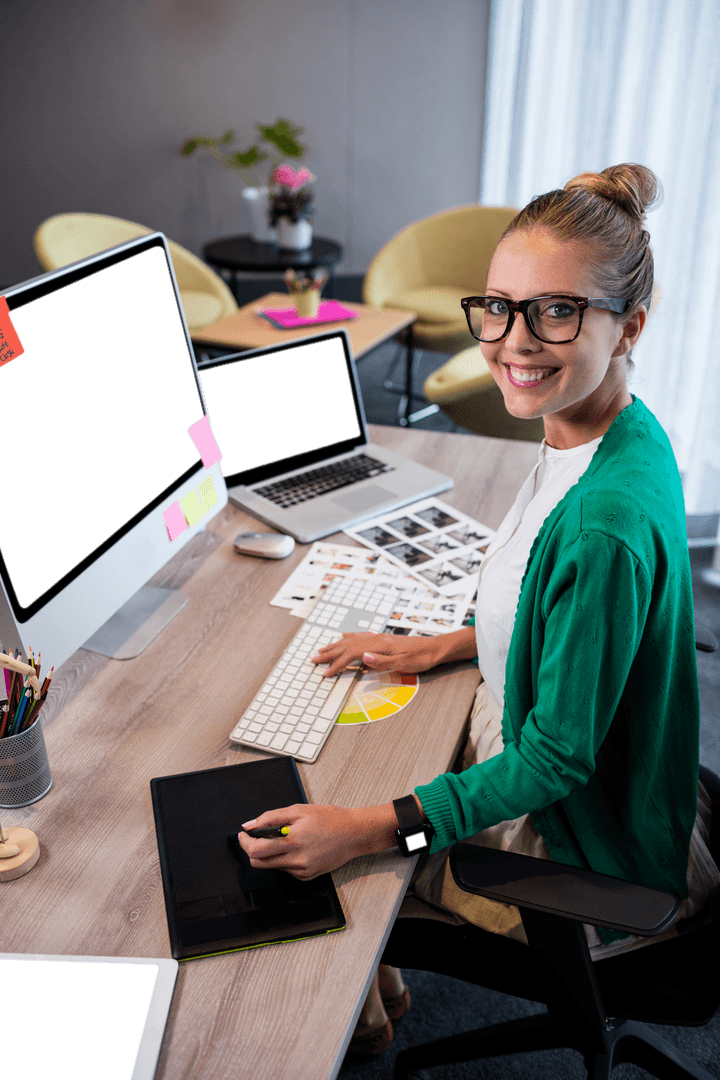 Smiling Professional Woman Working In Modern Office With Transparent Workspace