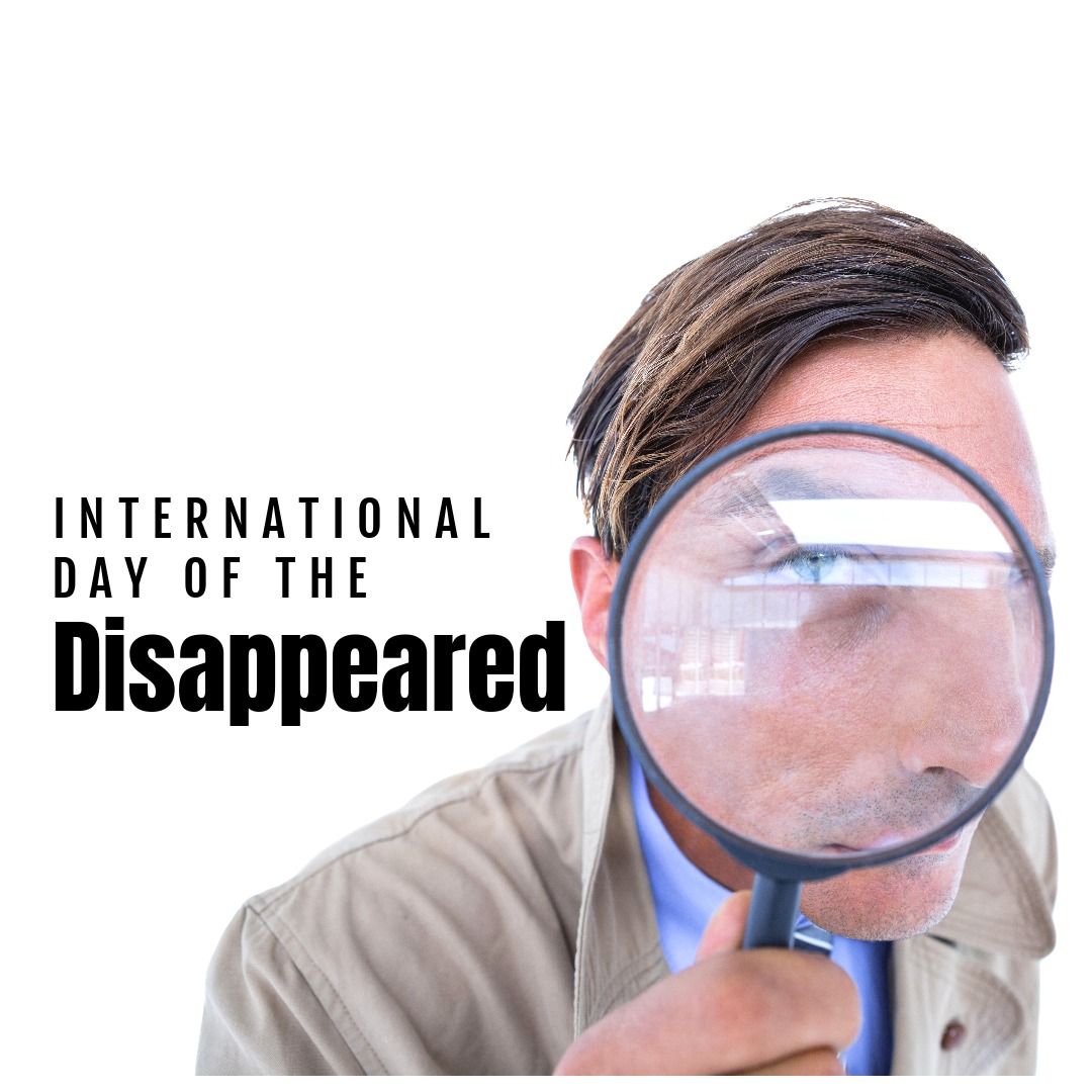 Caucasian young man looking with magnifying glass and international day of the disappeared text - Download Free Stock Templates Pikwizard.com