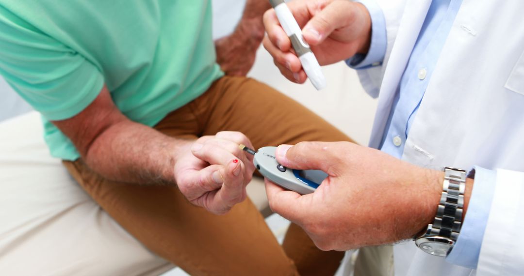 Doctor Checking Patient Blood Sugar Level Using Glucometer - Free Images, Stock Photos and Pictures on Pikwizard.com