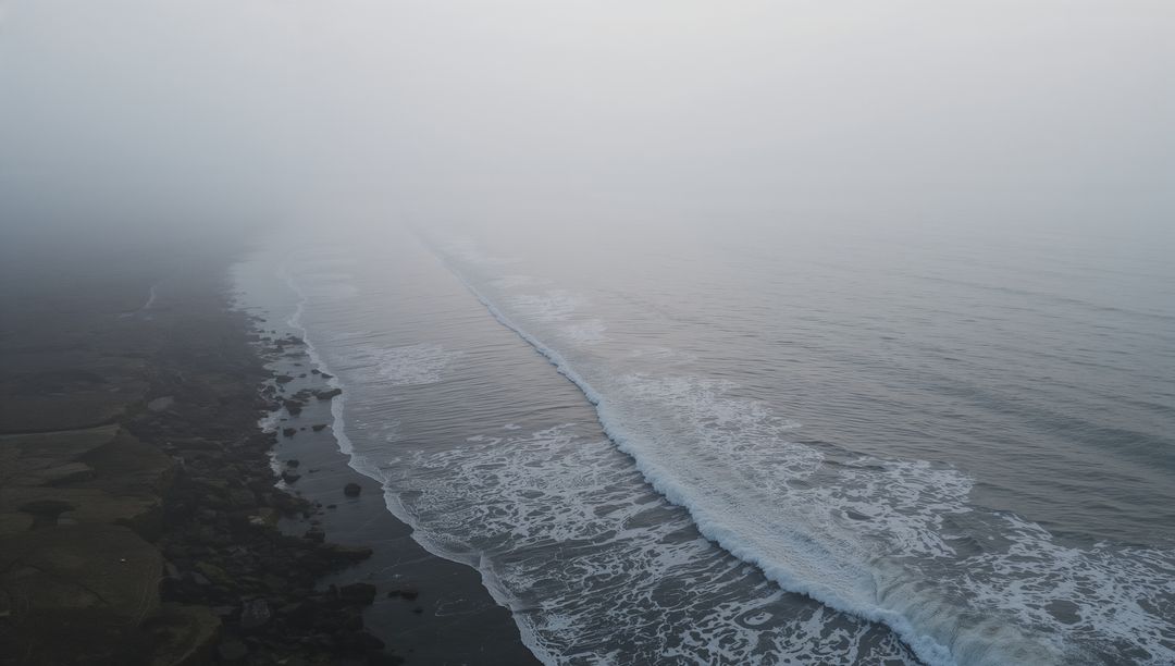 Moody Seascape with Rolling Waves in Foggy Atmosphere