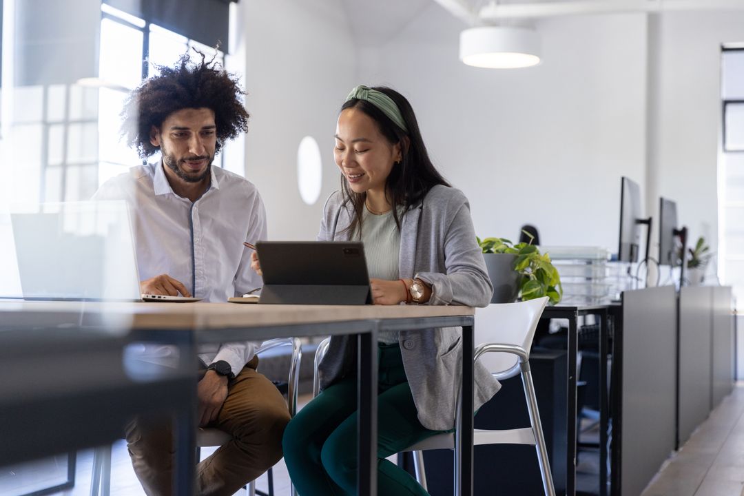 Collaborative Teamwork at Modern Office with Digital Devices