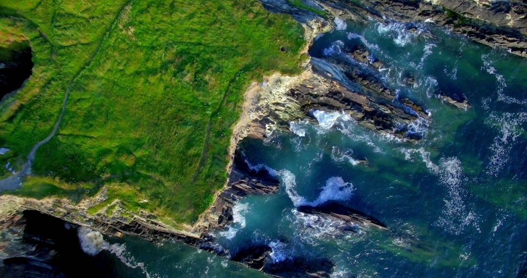 Aerial View of Rugged Coastline with Turquoise Waters and Lush Greenery - Free Images, Stock Photos and Pictures on Pikwizard.com