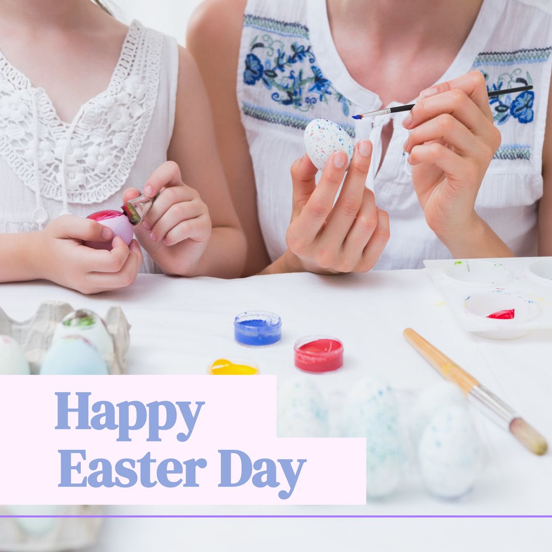Mother and Daughter Enjoying Egg Painting for Easter Celebration