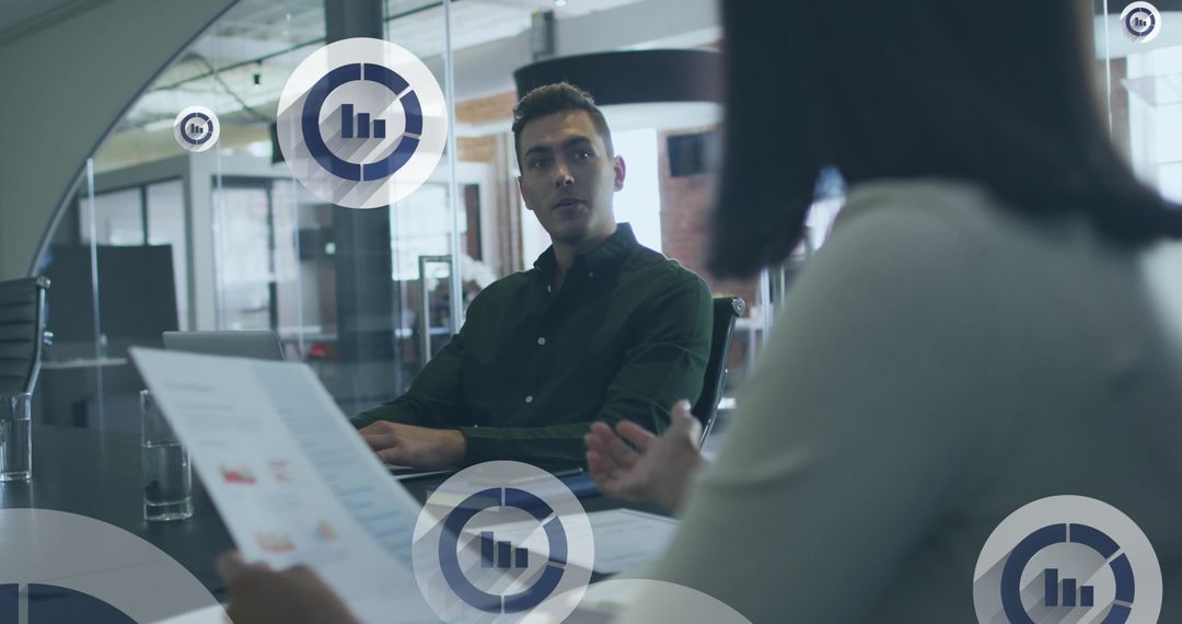 Executives in Modern Office Analyzing Data Projections