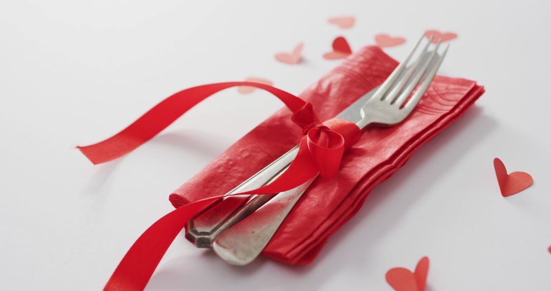 Romantic Table Setting with Red Ribbon and Hearts for Valentine's Day