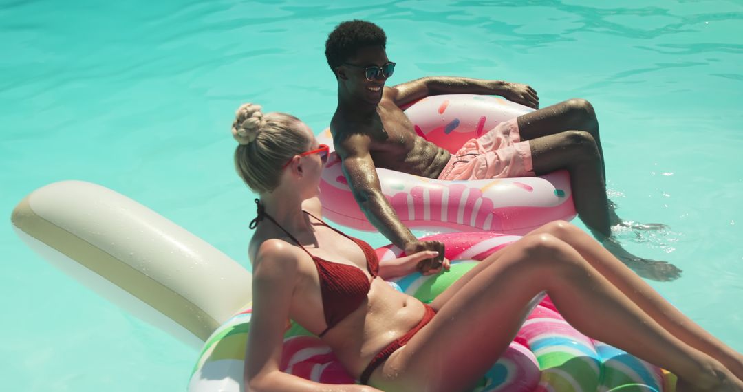 Couple Relaxing and Bonding on Inflatable Pool Floats