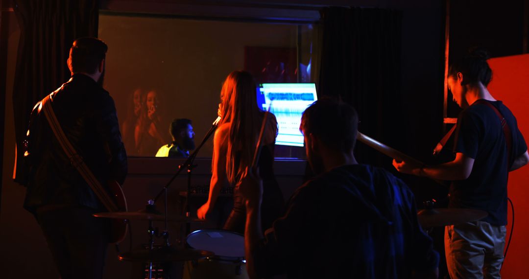 Indie Band Performing in Recording Studio