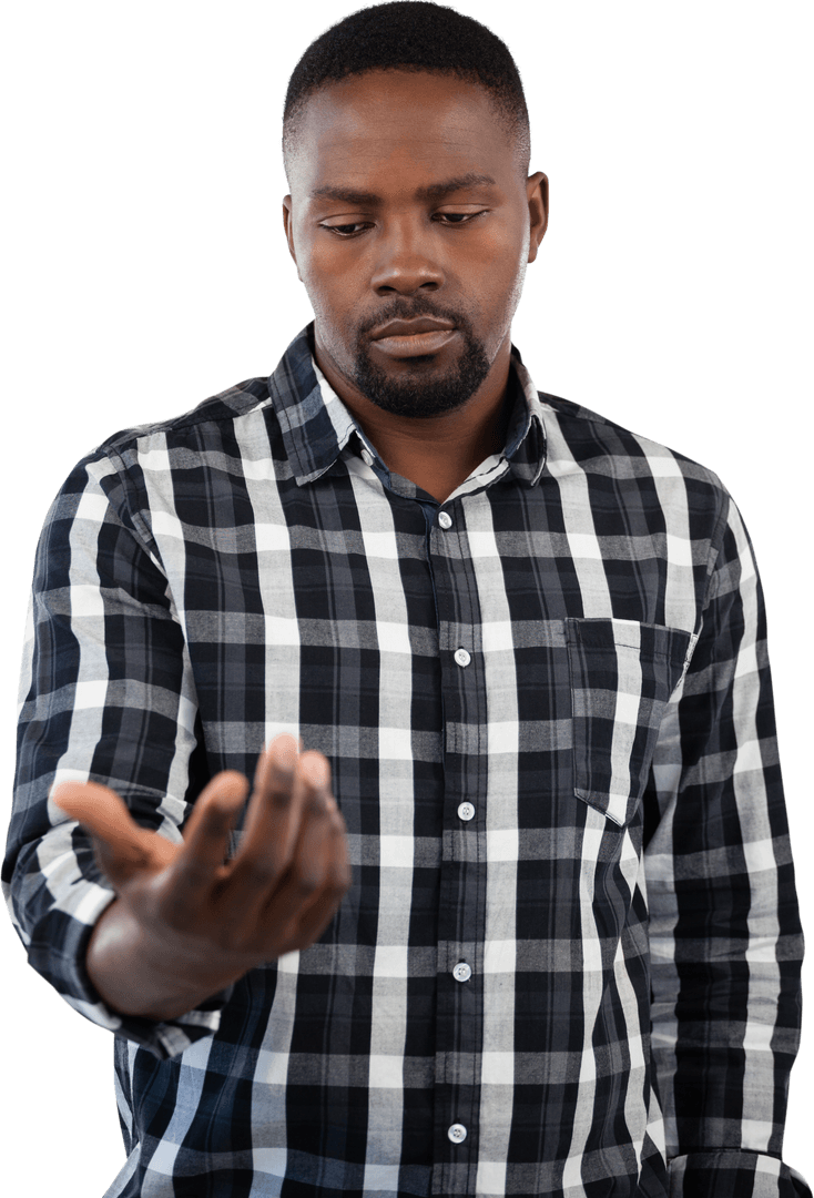 Upset Man Gazing at Hand with Focus Against Transparent Background