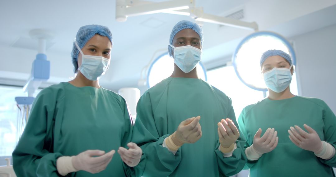 Diverse Team of Surgeons in Operating Room Preparing for Surgery