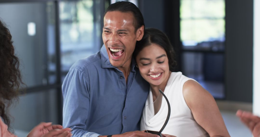 Diverse Team Celebrating Achievement at Workplace