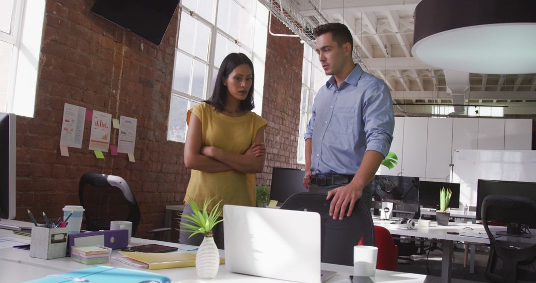 Collaborative Team Discussion in Modern Office Space