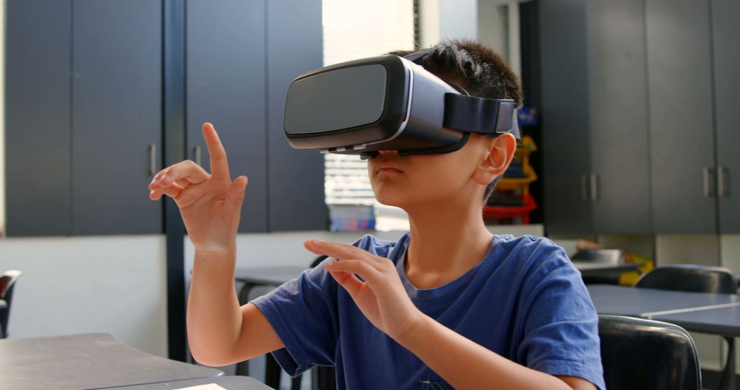 Young Boy Experiencing Virtual Reality in Classroom Setting