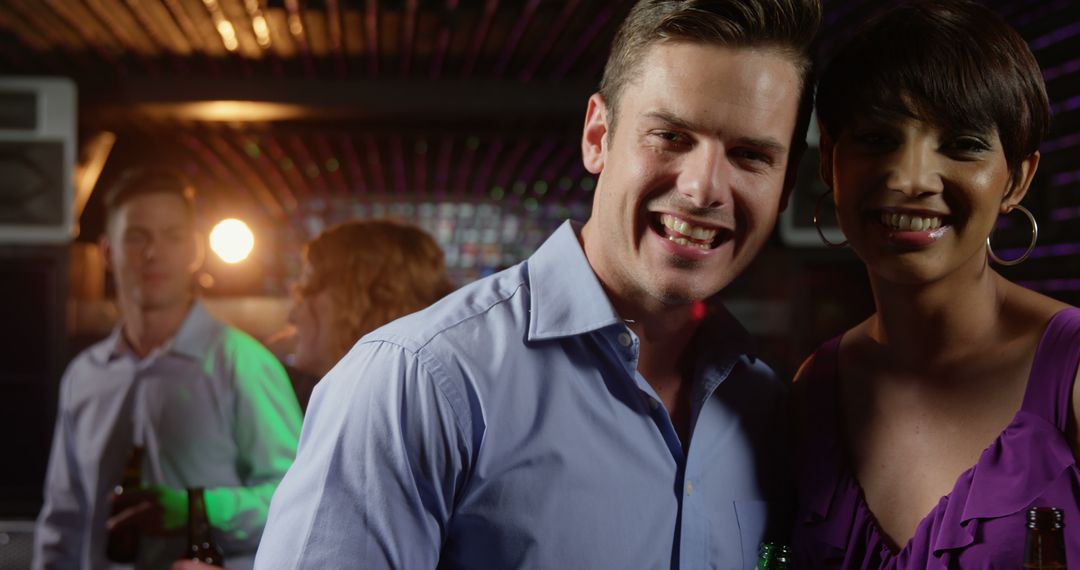 Happy Couple Smiling Together at Vibrant Pub