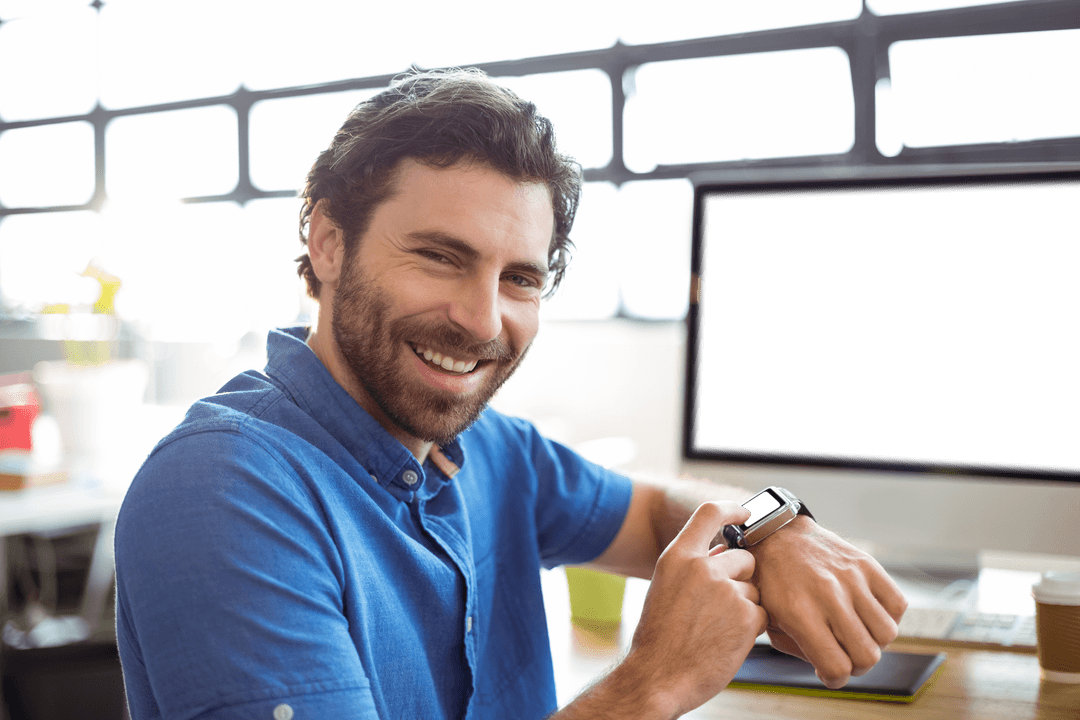 Smiling Professional Using Transparent Smartwatch in Office