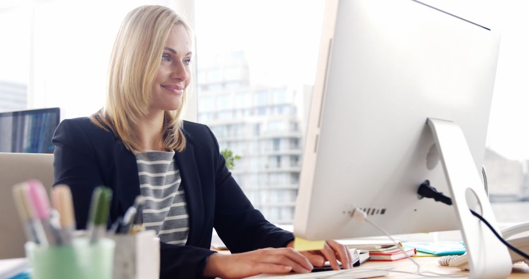 Focused Businesswoman Working in Bright Modern Office