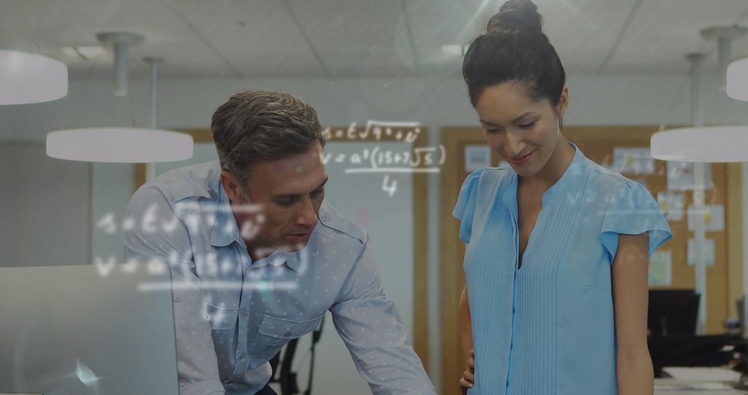 Coworkers Collaborating in Modern Office with Mathematical Formulas