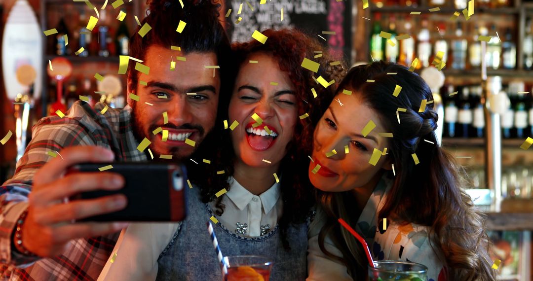 Group of Friends Taking Selfie in Festive Bar Setting