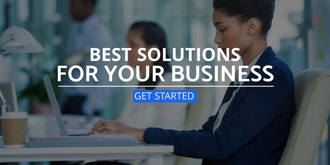 Focused Business Professional Working Productively on Laptop