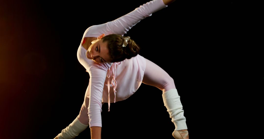 Female Ballet Dancer Stretching in Studio - Free Images, Stock Photos and Pictures on Pikwizard.com