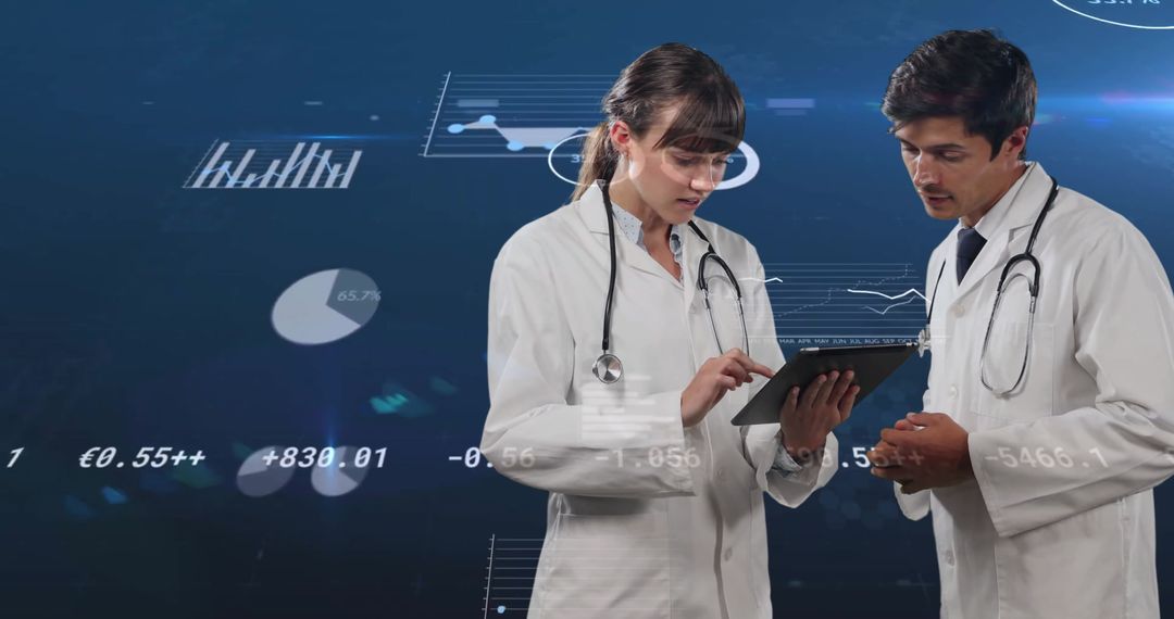 Doctors Analyzing Data on Tablet with Financial Graphics