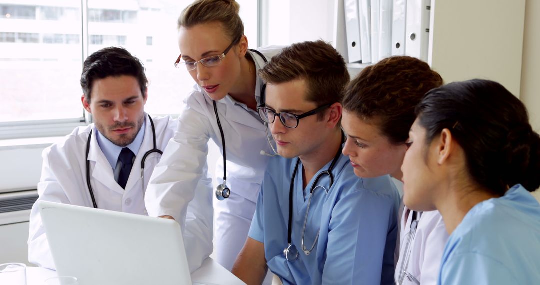 Medical Team Collaborating on Patient Treatment Plan - Free Images, Stock Photos and Pictures on Pikwizard.com