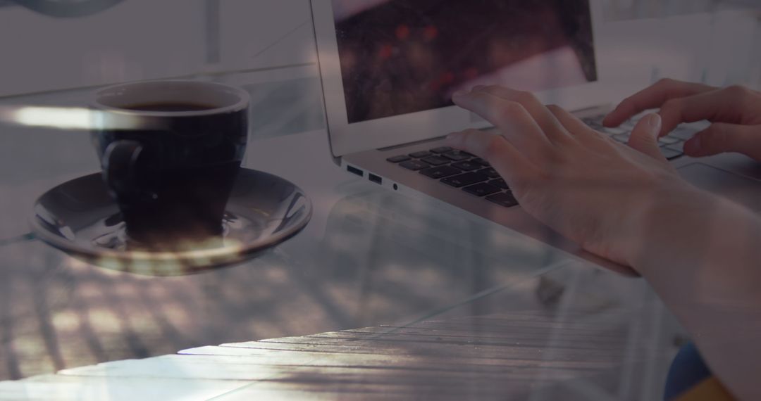 Hands Typing on Laptop with Coffee Reflects Busy Lifestyle Concept