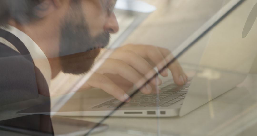 Double Exposure of Businessman Brainstorming with Laptop