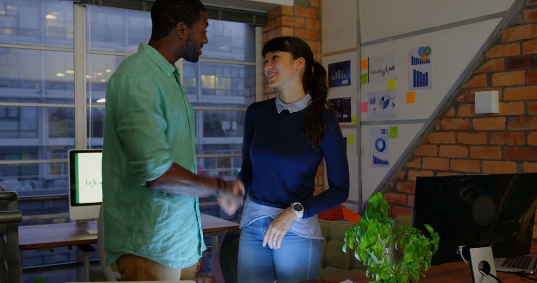 Coworkers Collaborating Creatively in Office Setting
