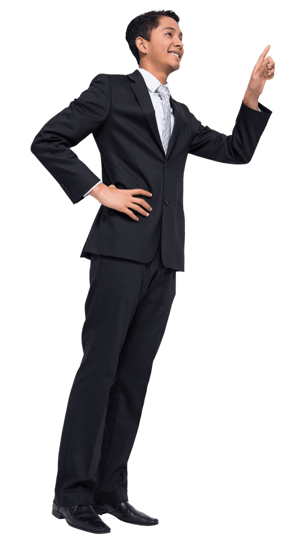 Happy biracial businessman pointing in suit on transparent background