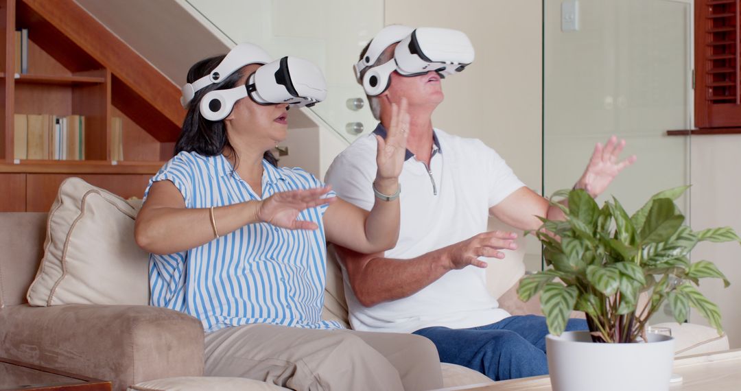 Senior Couple Engaged in Virtual Reality Experience at Home