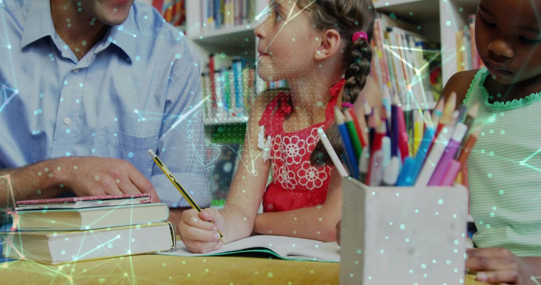 Teacher Assisting Girls with Homework in School Library