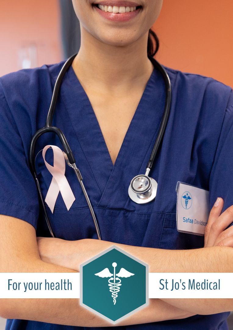 Healthcare Professional Displaying Cancer Awareness Ribbon at St Jo's Medical - Download Free Stock Templates Pikwizard.com